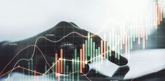 TopStep vs Apex Trader Funding: A Closer Look financial diagram with finger in apex trading