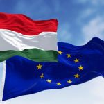 Beyond Latest EU-Hungary Tussle Is a Deteriorating Rule-Of-Law Picture Across Europe Flags of Hungary and the European Union fluttering together on a clear day