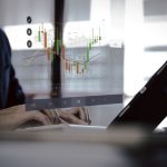 businessman holding virtual trading