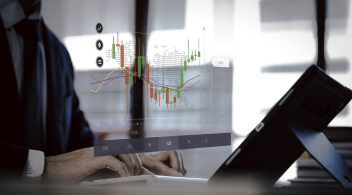 TradeZella Promo Code: Getting The Best Price On This Powerful Trade Journal businessman holding virtual trading