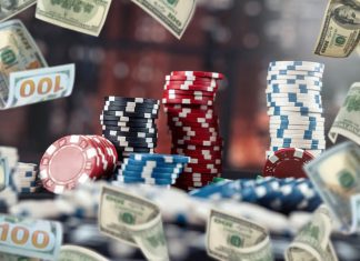 Poker chips stack on table at casino