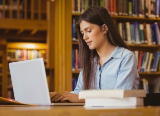 Got one of These? – Study Names the Most Employable Degrees Woman studying in the library