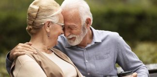 What Senior Dating Sites Are Completely Free? Find Love Without Breaking Your Bank! senior couple holding a cup of coffee