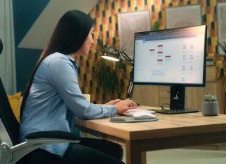 Woman using a desktop computer