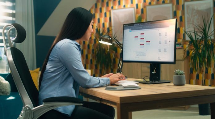 From Clutter to Order: Transform Your Workspace with Strategic Storage Woman using a desktop computer