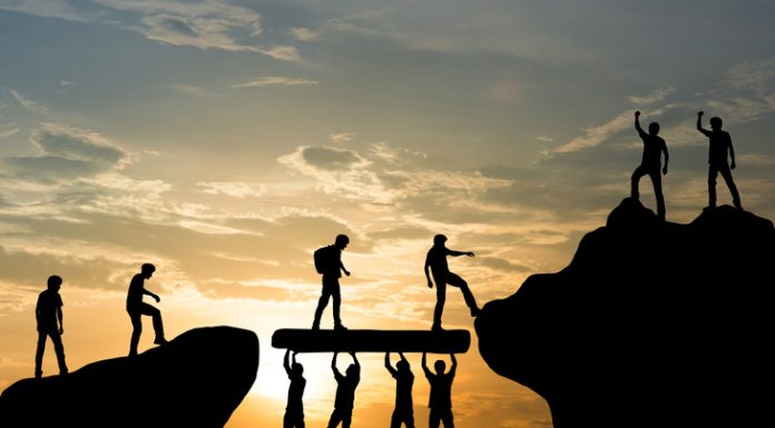 Procurement Best Practices: A Comprehensive Guide for Success Group of people climbing and helping each other