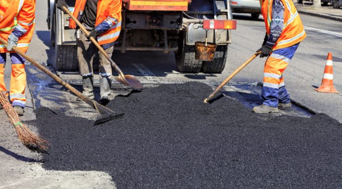 Ultimate Guide To Choosing Best Asphalt Paving Contractor In Bellevue The workers are asphalt paving the roads.