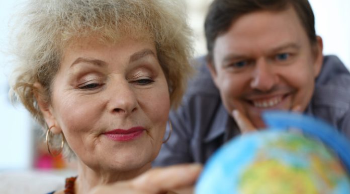 Searching for a Long-Lost Relative: Effective Methods and Advice old woman exploring globe