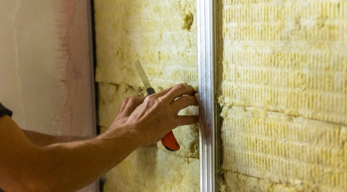 Insulating Your Business: Custom Solutions for Commercial Properties insulating a room wall
