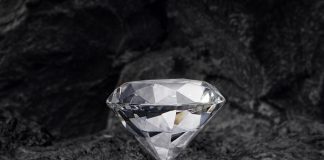 diamond on black coal background