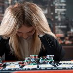 upset woman losses poker game in casino, risk