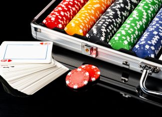 Poker game case on black background close up