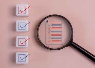 Magnifying glass with a list of check boxes