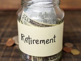 Retirement label on a jar filled with money