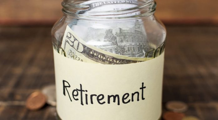 The Importance of Retirement Planning for Entrepreneurs Retirement label on a jar filled with money
