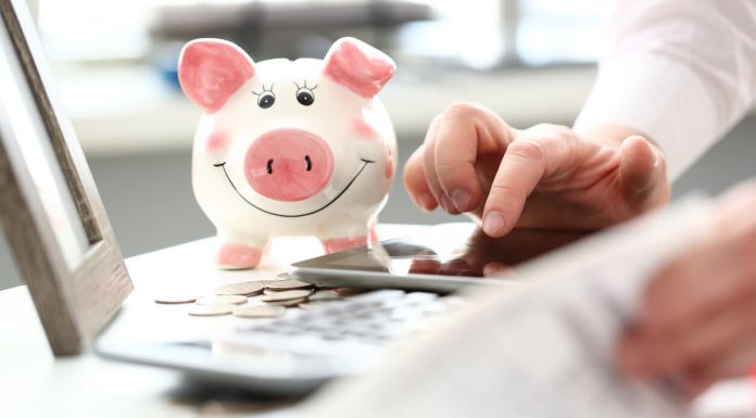 4 Smart Ways To Use a Personal Loan Male hand working with electronic digital tablet