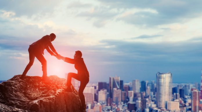 Superman Is Not Real, Neither Is SuperLeader businessman helping another businessman