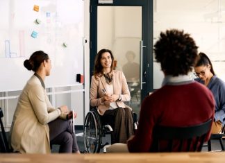 Making Inclusivity a Permanent Change, Not a Marketing Trend businesswomen having a meeting