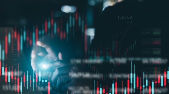 German Stock Index Hits Record Businessman working in office, technical price chart and red and green candlestick chart indicator and computer screen background for stock trading, double exposure Traders analyze data.