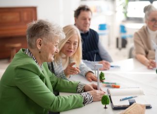 Attention to the Third Success Factor is Always Necessary community meeting or a discussion between residents and energy professionals