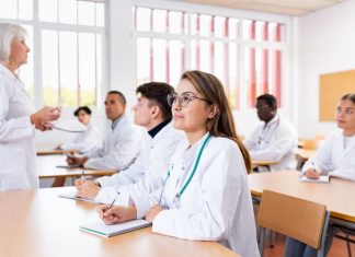 Preparing for the GAMSAT for Medical School medical students sitting at desk in classroom during lecture