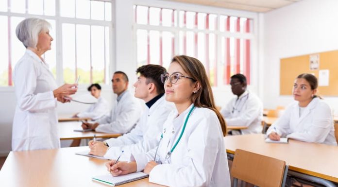 Preparing for the GAMSAT for Medical School medical students sitting at desk in classroom during lecture