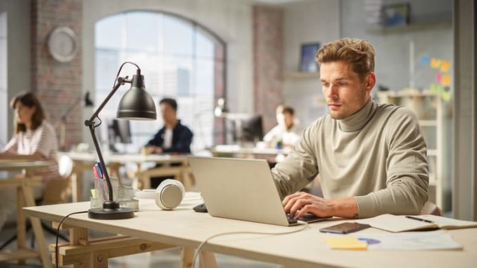 A man working using laptop