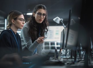 The Business Imperative of Female Leadership in AI 2 woman working