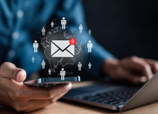 How to Build a Highly Successful Email Marketing Funnel for Conversions Businessman sending emails by laptop and smartphone to customers