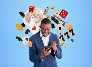 African with smartphone winning in online casino