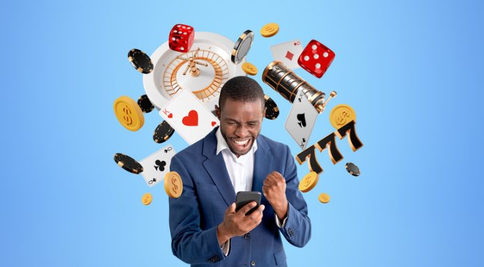 South African Online Casino Player Strikes Gold with R189,000 Win at Tusk Casino African with smartphone winning in online casino