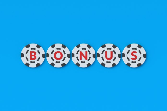 Word bonus on casino chips. Special promotions. Gambling advertising. Attraction of new clients. Receive bonuses. Profitable cashback and rewards. Gaming business concept. 3d render word bonus in casino chips
