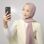 woman is scanning her face using AI scanner