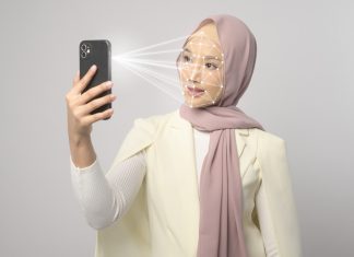 woman is scanning her face using AI scanner