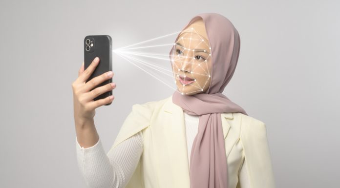woman is scanning her face using AI scanner