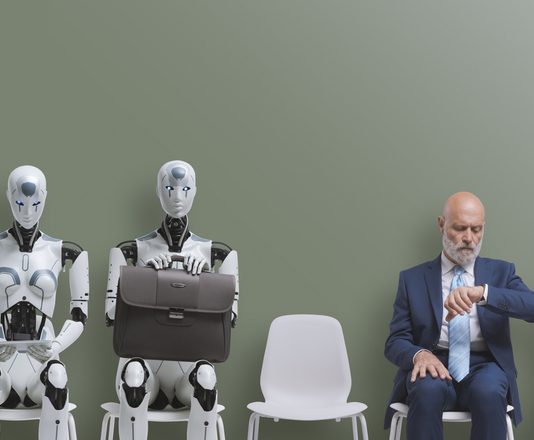 AI robot applicant sitting with business people