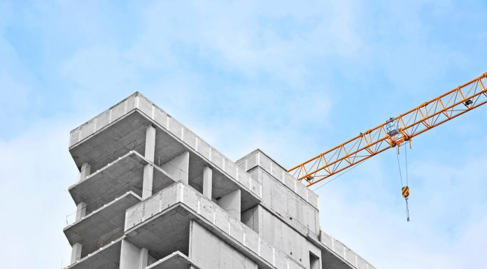 6 Tips for Building Long-Lasting Structures Crane and highrise construction site