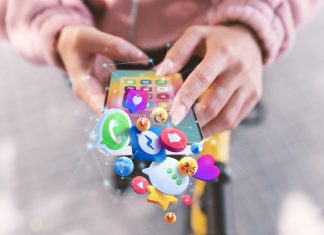 Digital Advertising with AI: Bacancy’s Success in Boosting ROI ands holding smartphone social media