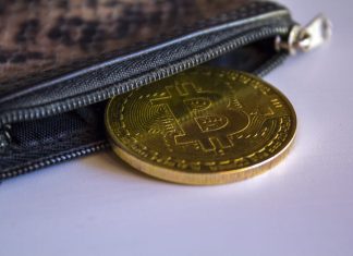 Bitcoin in leather wallet