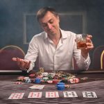 7 Quirky Behaviour Among Poker Players Man playing poker
