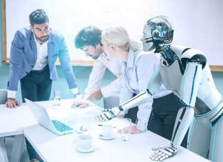 AI Anxiety: How Business Leaders Can Build Trust in the Bots Business people working with robot