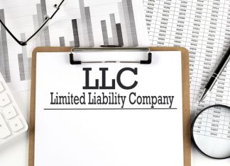 LLC with calculator and magnifying glass