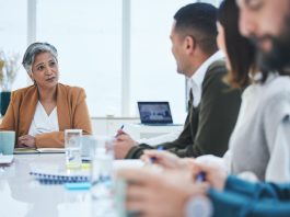 CEO in a meeting with the team members