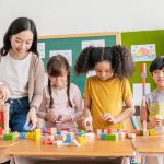 Fun Games to Play at School: A Comprehensive Guide for Unforgettable School Days Students playing at school together with their teacher