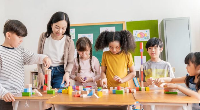 Fun Games to Play at School: A Comprehensive Guide for Unforgettable School Days Students playing at school together with their teacher