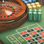 Regional Features of Gaming Establishments, Using the Example of Pin-Up India Casino roulette wheel with casino chips