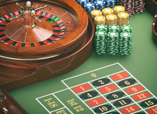 Casino roulette wheel with casino chips