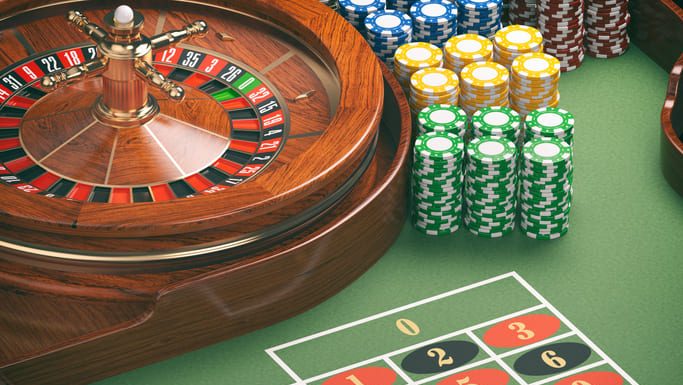 Casino roulette wheel with casino chips