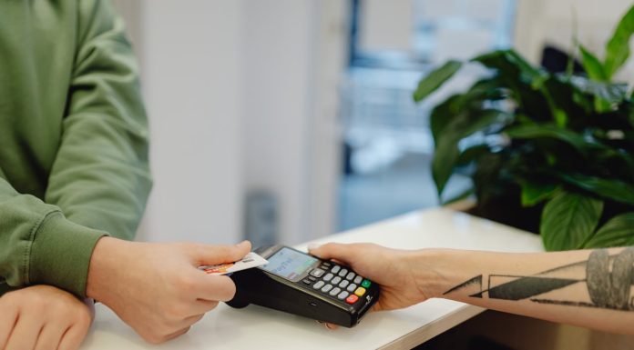 A Person Holding a Bank Card