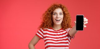 Woman showing her phone